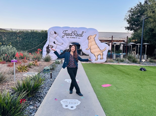 Dr. Lily outside the Feed Real summit entrance
