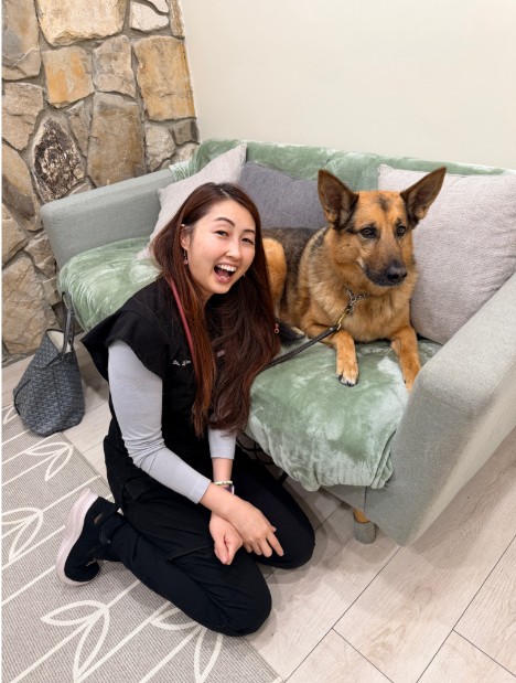 Dr. Chen with a German Shepard